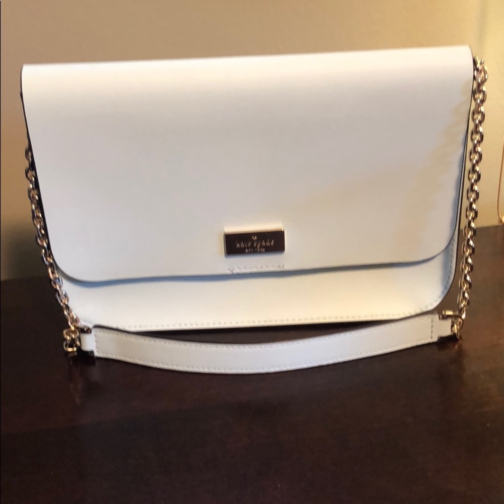 Kate Spade light blue slim bag.